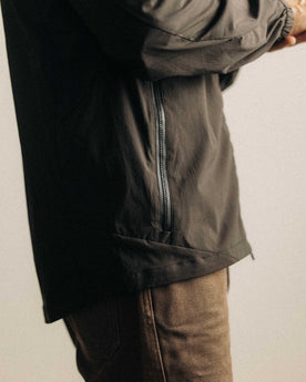fit model with his hands in his pockets wearing The Ridgeline Jacket in Coal, Outerwear by Taylor Stitch