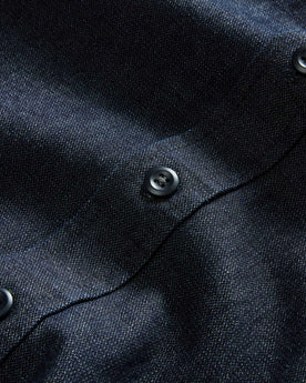material shot of the buttons on The Saddler Shirt in Indigo Broken Twill, Wovens by Taylor Stitch