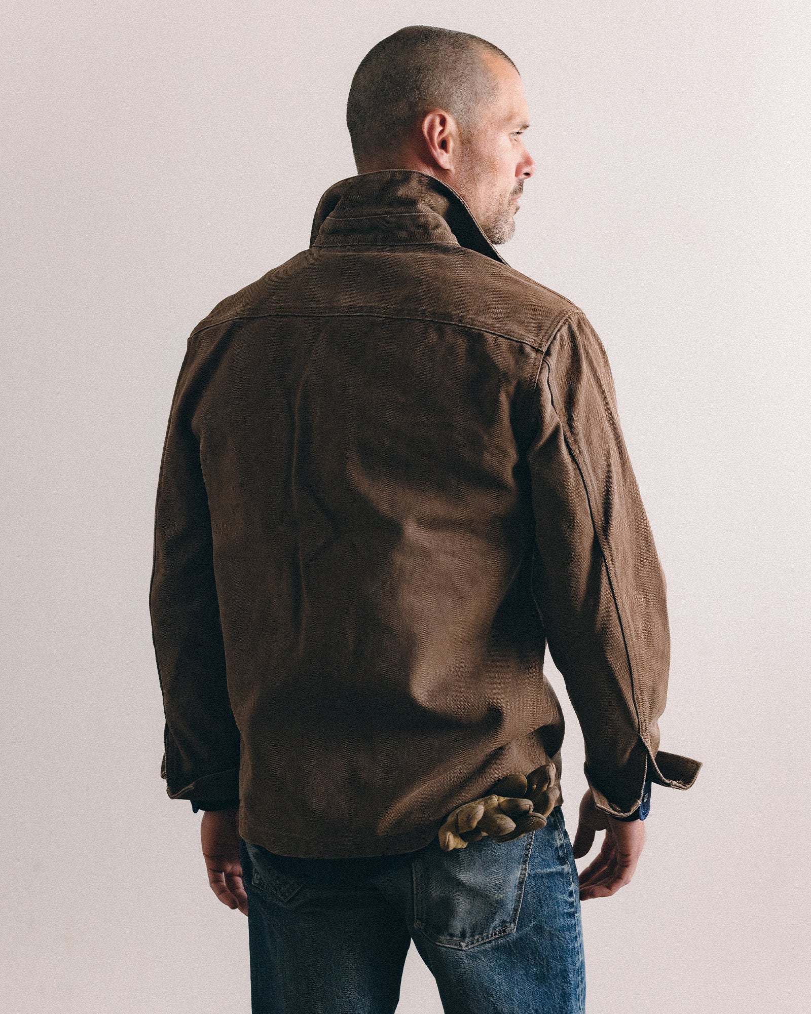 fit model showing details on The Shop Shirt in Aged Penny Chipped Canvas, Wovens by Taylor Stitch