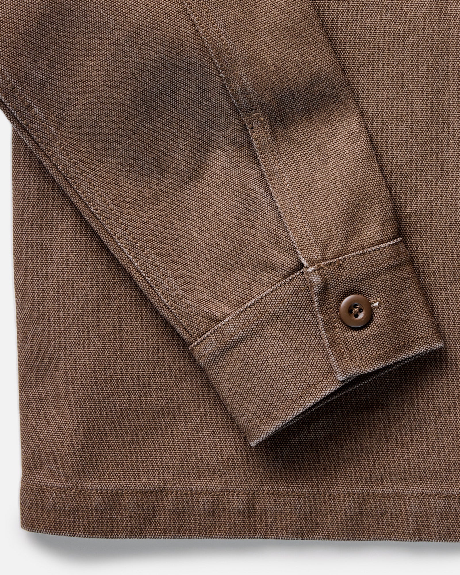 material shot of the buttons on The Shop Shirt in Aged Penny Chipped Canvas, Wovens by Taylor Stitch
