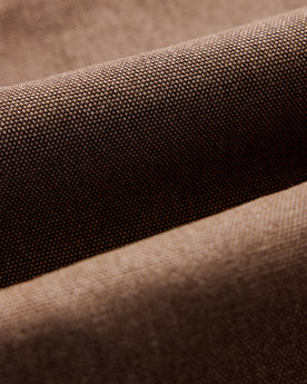 flatlay of the inside of The Shop Shirt in Aged Penny Chipped Canvas, Wovens by Taylor Stitch