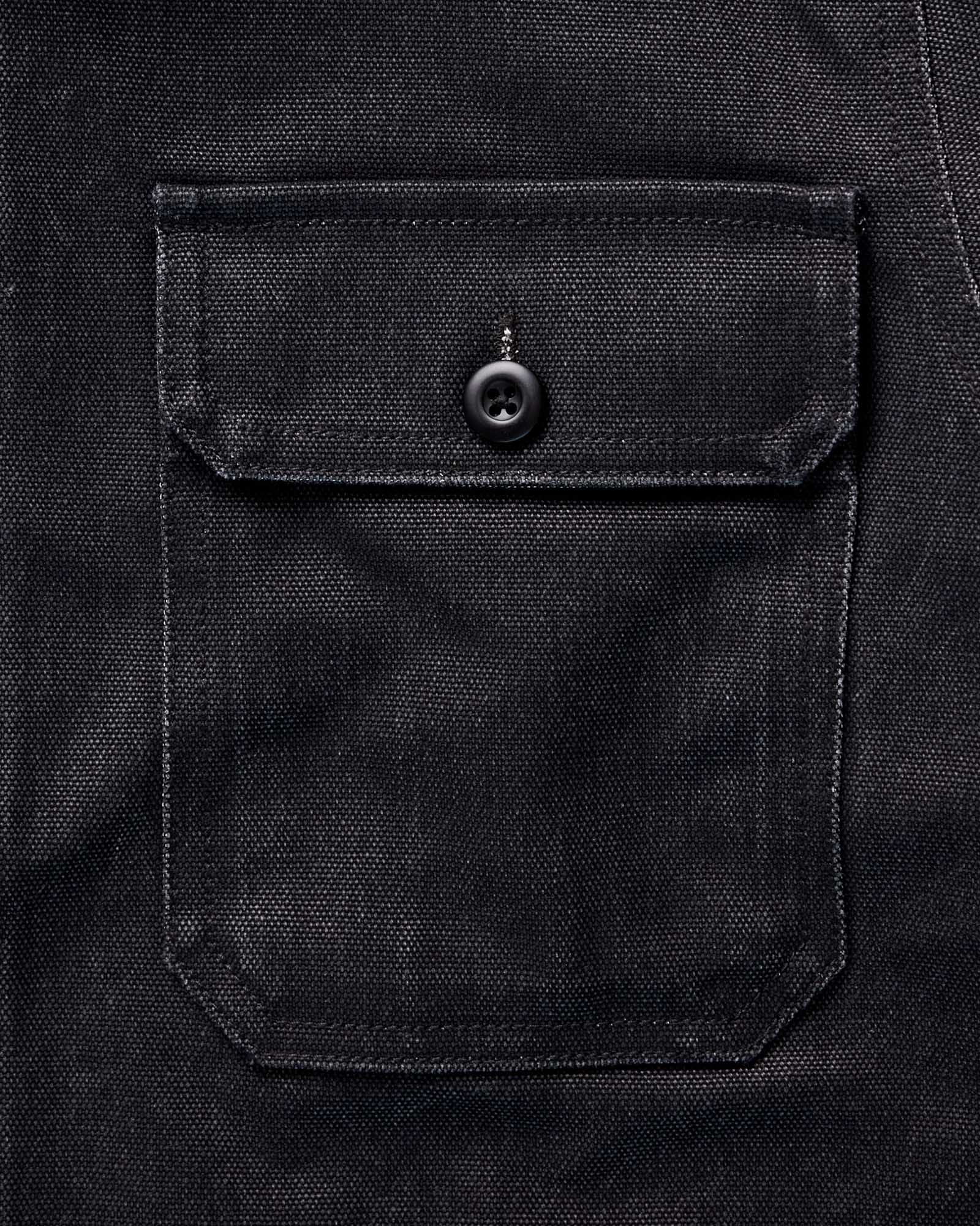 material shot of the pocket on The Shop Shirt in Coal Chipped Canvas, Wovens by Taylor Stitch