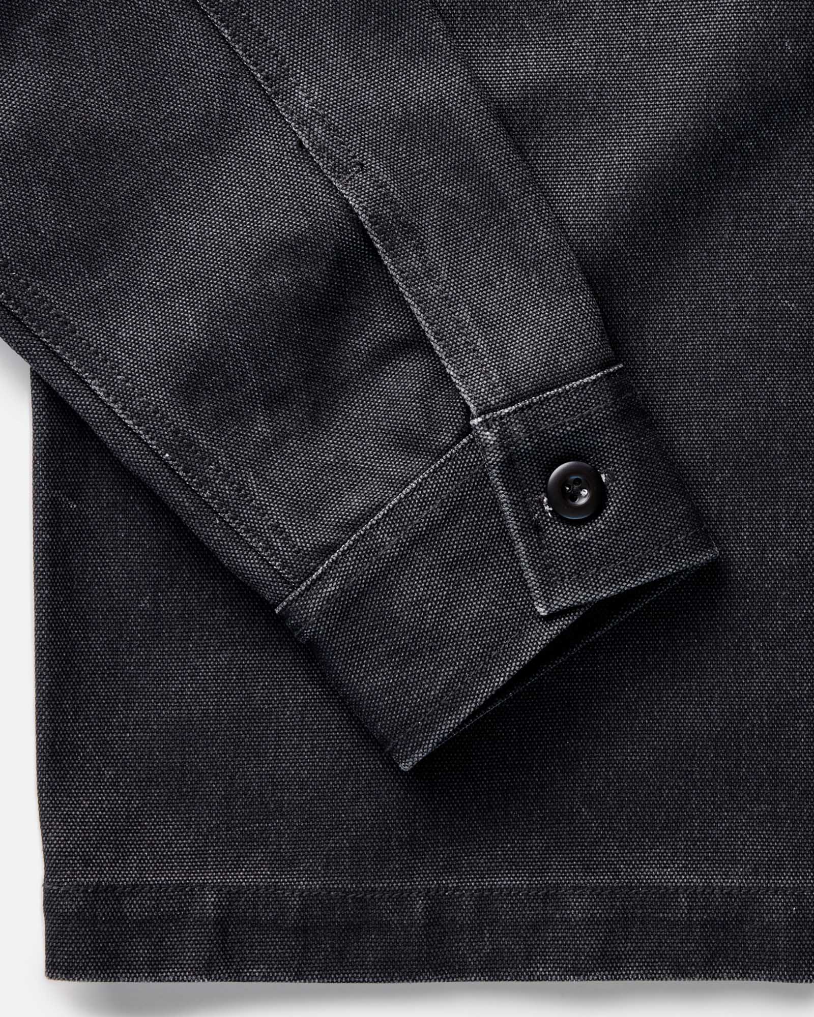 material shot of the sleeve on The Shop Shirt in Coal Chipped Canvas, Wovens by Taylor Stitch