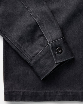 material shot of the sleeve on The Shop Shirt in Coal Chipped Canvas, Wovens by Taylor Stitch