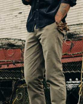 fit model showing off The Slim Foundation Pant in Organic Smoked Olive, Bottoms by Taylor Stitch