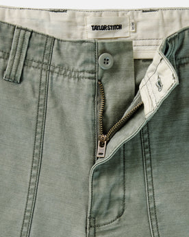 material shot of the waistband on The Surplus Pant in Field Olive Reverse Sateen, Bottoms by Taylor Stitch