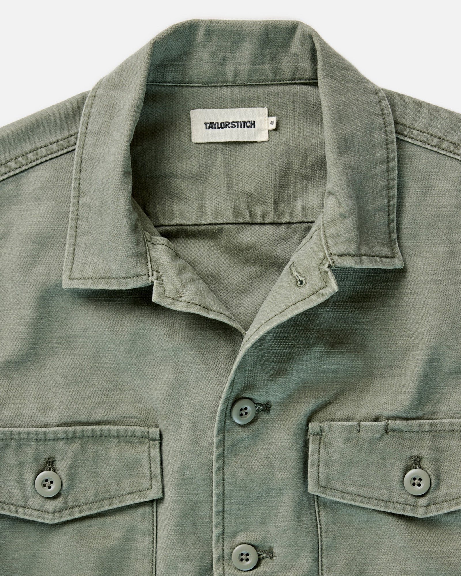 flatlay of The Surplus Shirt in Field Olive Reverse Sateen open, Wovens by Taylor Stitch