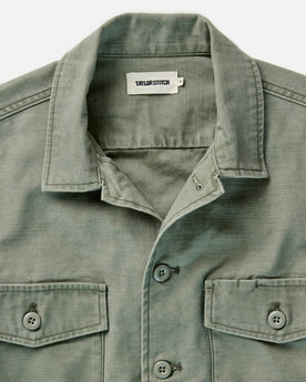 flatlay of The Surplus Shirt in Field Olive Reverse Sateen open, Wovens by Taylor Stitch