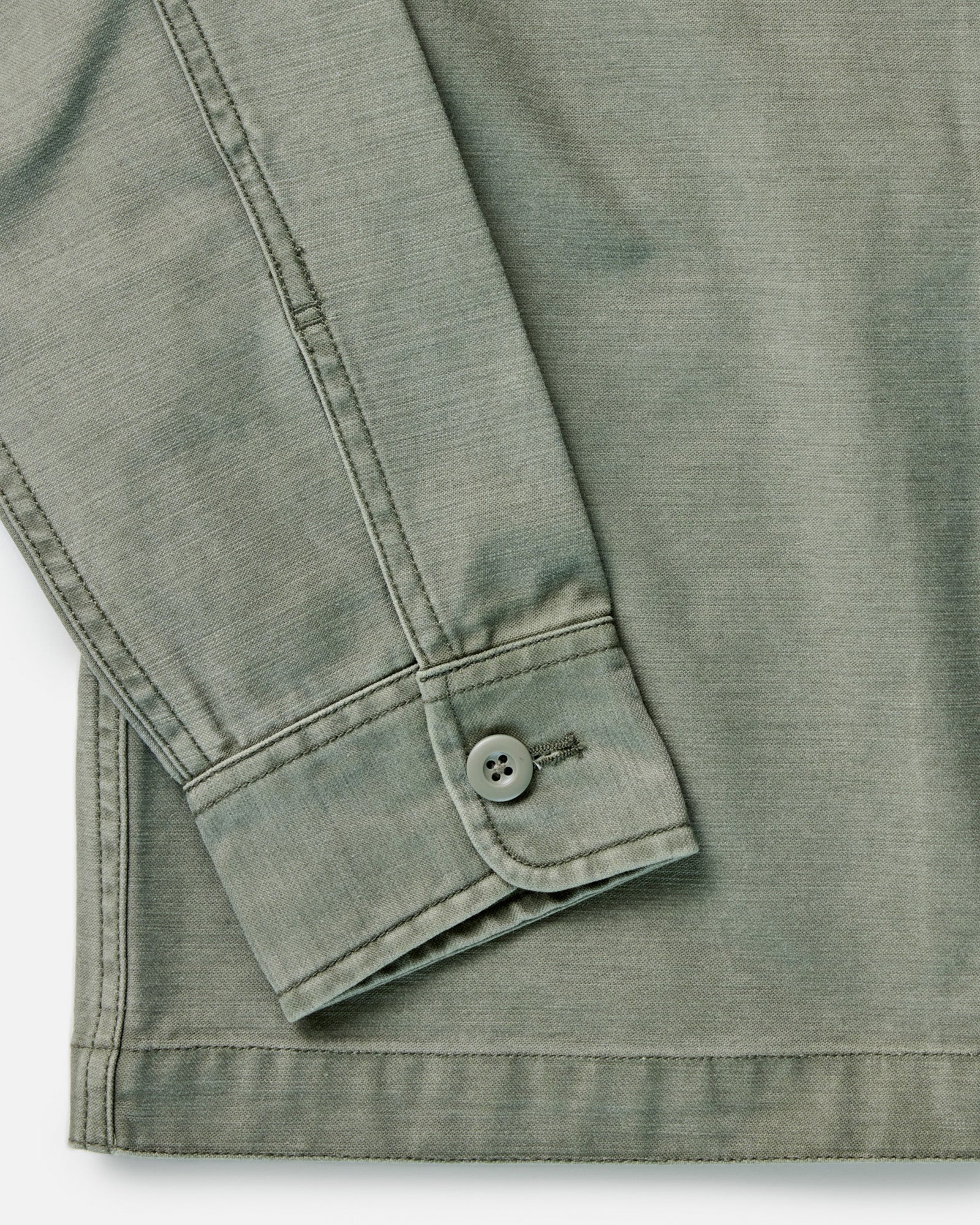 material shot of the collar on The Surplus Shirt in Field Olive Reverse Sateen, Wovens by Taylor Stitch