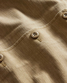 material shot of the buttons on The Surplus Shirt in Khaki Reverse Sateen, Wovens by Taylor Stitch