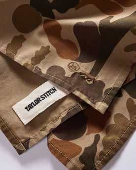 folded flatlay of the tag on The Bandana in Arid Camo, Accessories by Taylor Stitch