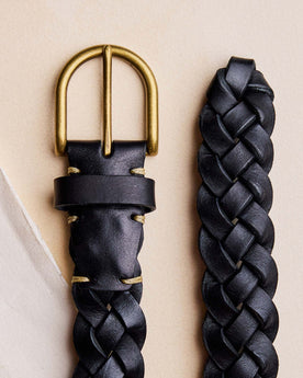editorial flatlay of the buckle on The Braided Belt in Black, Accessories by Taylor Stitch