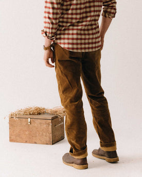 flatlay of The Carnegie Pant in Bourbon Corduroy, Bottoms by Taylor Stitch