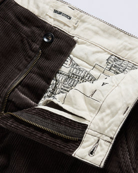 material shot of the zipper on The Carnegie Pant in Soil Corduroy, Bottoms by Taylor Stitch