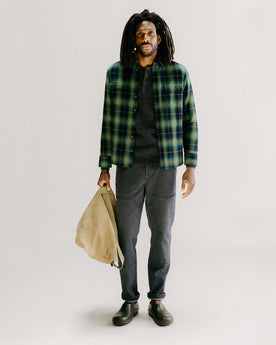 fit model posing in The Chore Pant in Coal Chipped Canvas, Bottoms by Taylor Stitch