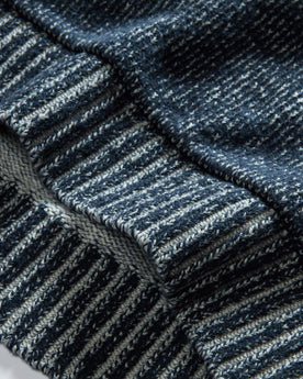 material shot of the bottom hem on The Headland Pullover Sweater in Marled Navy, Knits by Taylor Stitch
