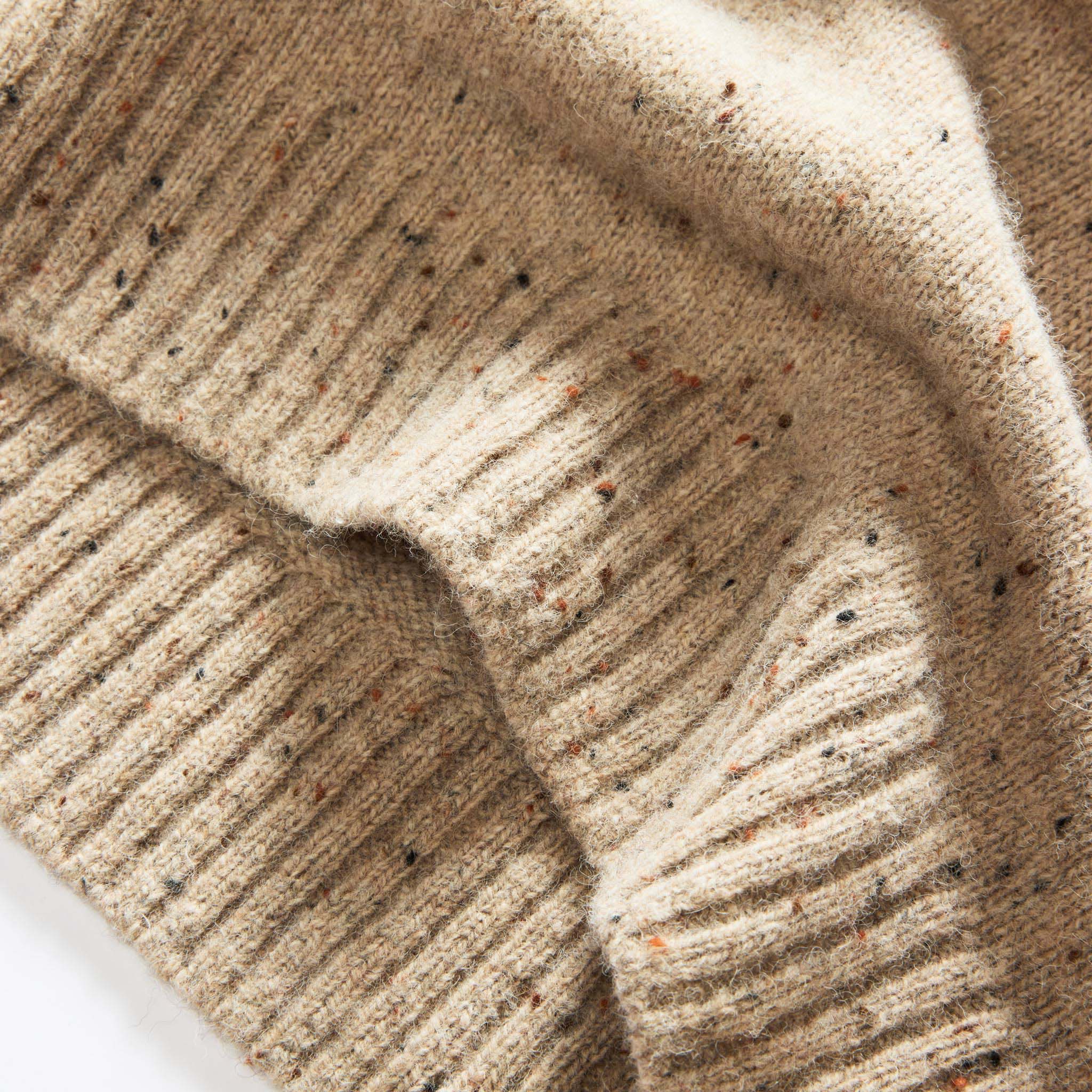 material shot of the bottom hem on The Lodge Sweater in Sand Donegal, Knits by Taylor Stitch