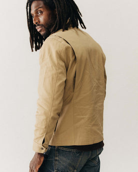 fit model showing off the back of The Pathfinder Jacket in Khaki Dry Wax, Outerwear by Taylor Stitch