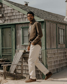 fit model showing off the buttons on The Utility Shirt in Cypress Sashiko, Wovens by Taylor Stitch