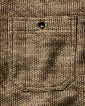 material shot of the buttons on The Utility Shirt in Cypress Sashiko, Wovens by Taylor Stitch