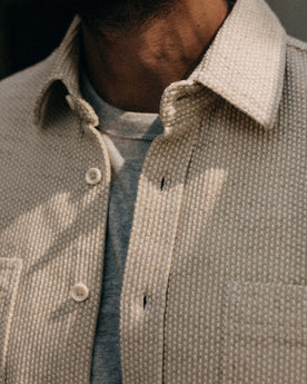 fit model drinking coffee wearing The Utility Shirt in Natural Sashiko, Wovens by Taylor Stitch