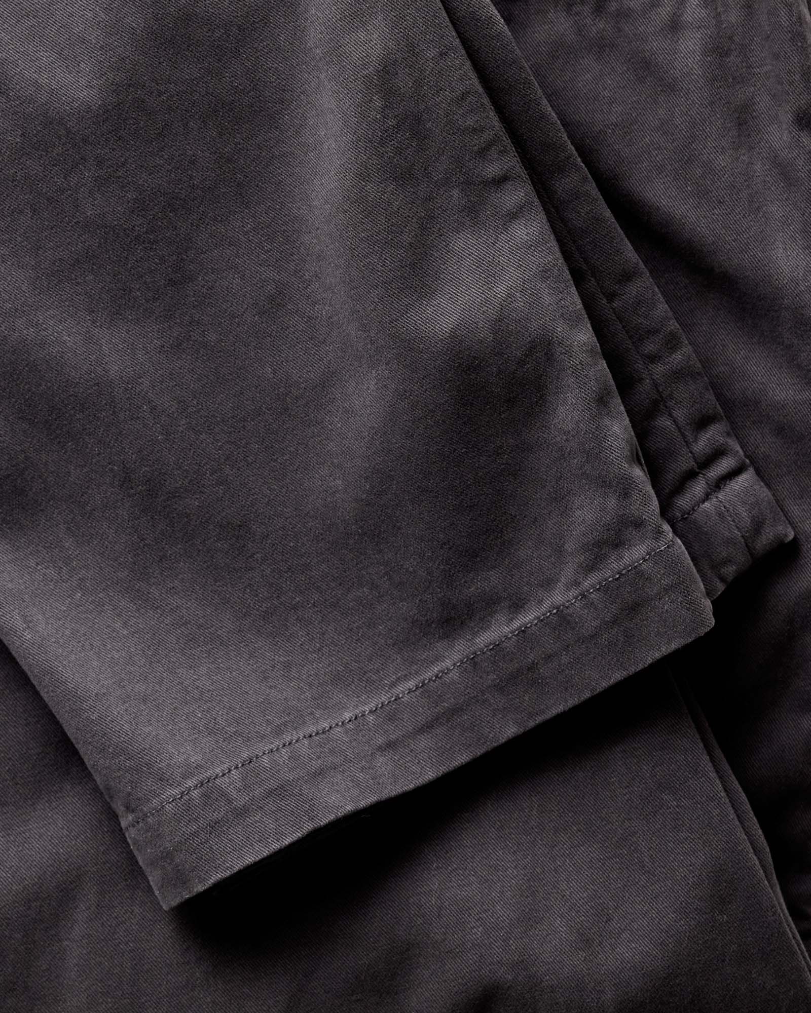 material shot of the waistband on The Democratic Foundation Pant in Organic Faded Black, Bottoms by Taylor Stitch