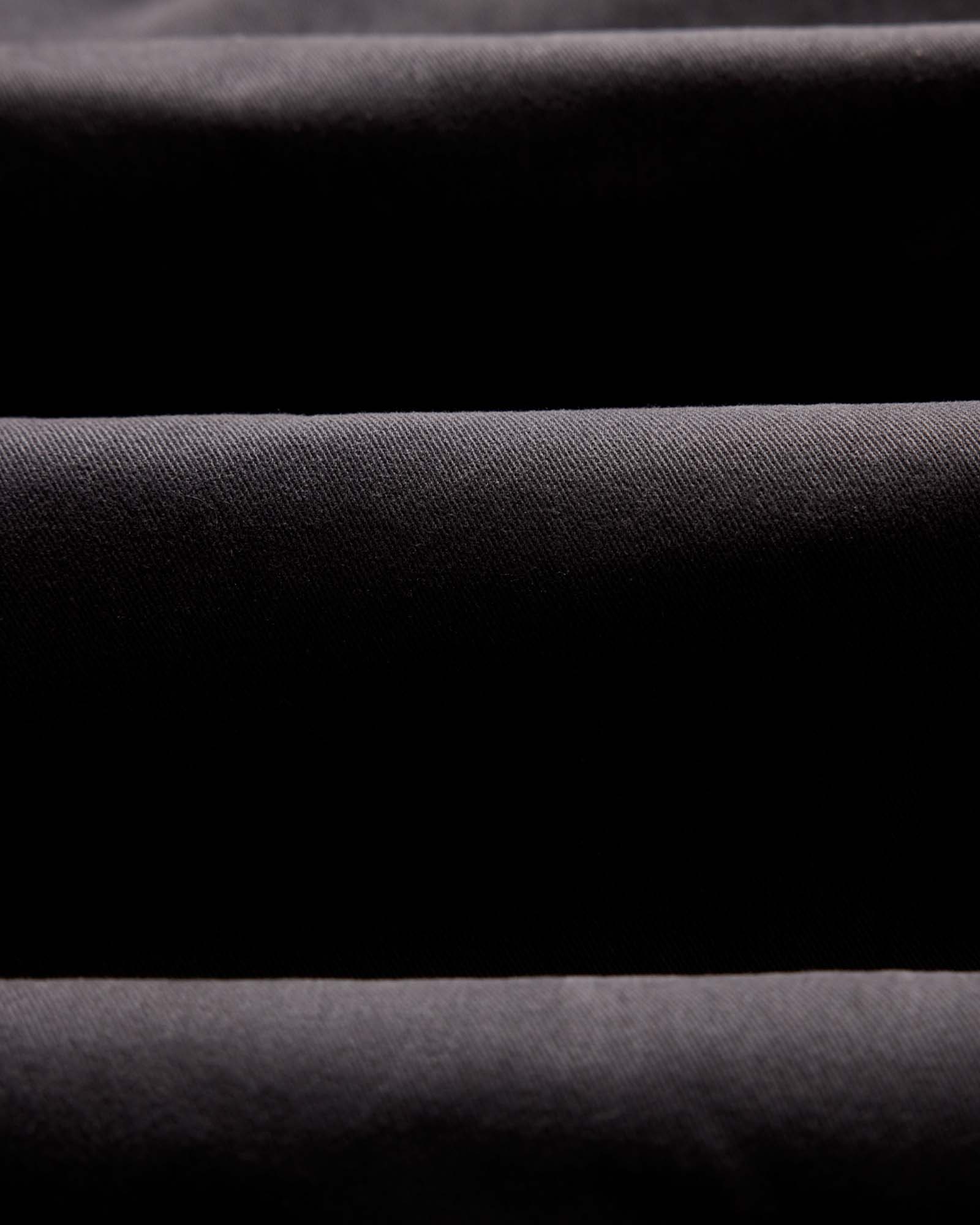 material shot of the back of The Democratic Foundation Pant in Organic Faded Black, Bottoms by Taylor Stitch