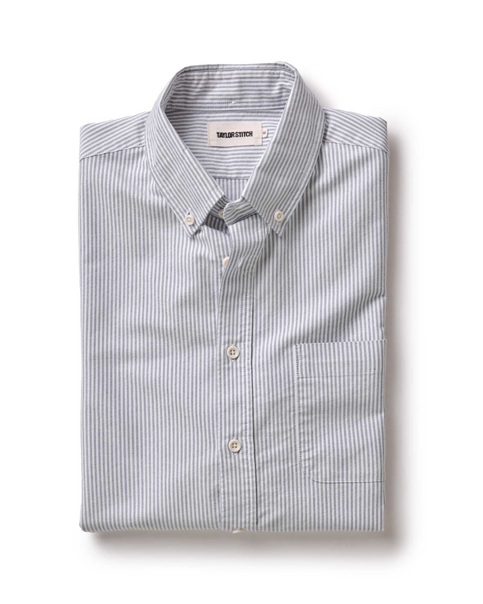 folded flatlay of The Jack in Navy University Stripe Everyday Oxford, Wovens by Taylor Stitch