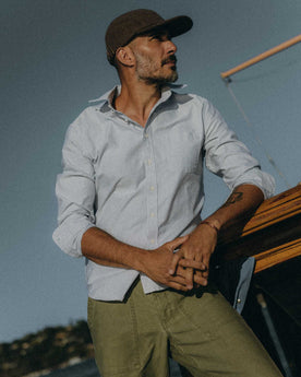 fit model posing in The Jack in Navy University Stripe Everyday Oxford, Wovens by Taylor Stitch