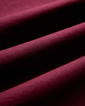 material shot of the fabric on The Jack in Burgundy Oxford, Wovens by Taylor Stitch