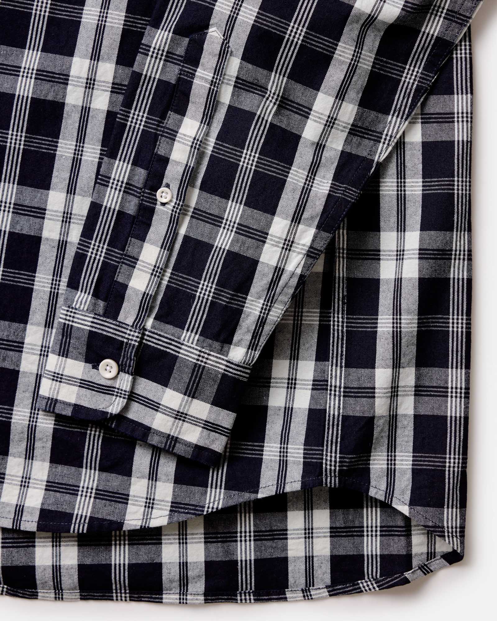 material shot of the hem on The Jack in Rinsed Indigo Plaid Oxford, Wovens by Taylor Stitch