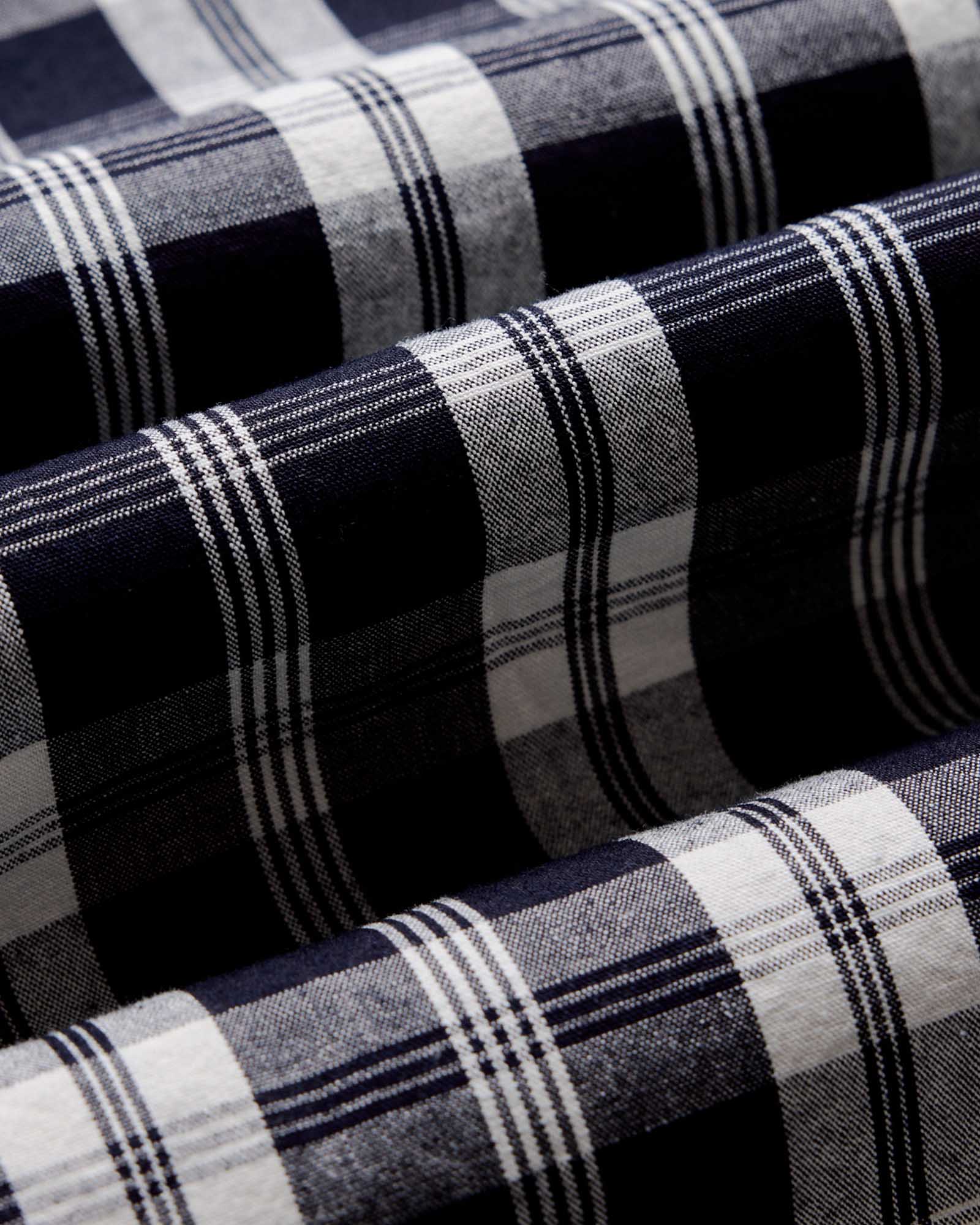 material shot of the fabric on The Jack in Rinsed Indigo Plaid Oxford, Wovens by Taylor Stitch