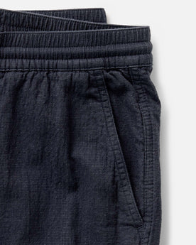material shot of the pocket on The Apres Pant in Coal Double Cloth, Bottoms by Taylor Stitch