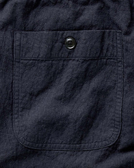 material shot of the back pocket on The Apres Pant in Coal Double Cloth, Bottoms by Taylor Stitch