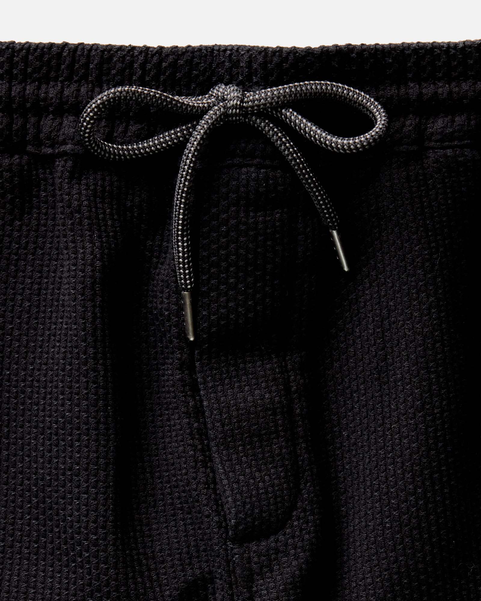 material shot of the waistband on The Apres Pant in Black Indigo Sashiko, Bottoms by Taylor Stitch