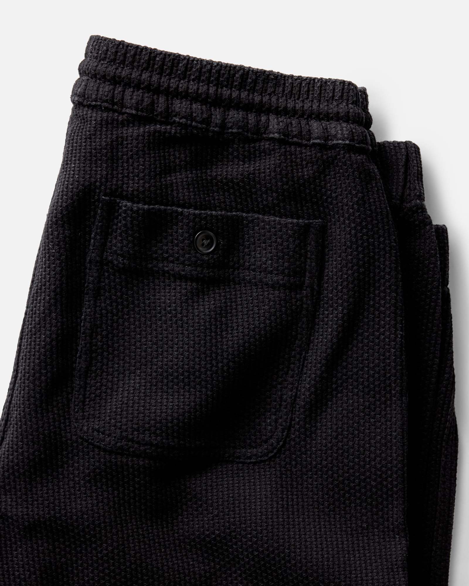 material shot of the back pocket on The Apres Pant in Black Indigo Sashiko, Bottoms by Taylor Stitch