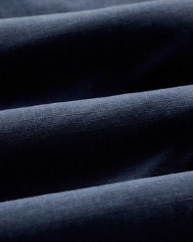 material shot of the fabric on The Breakwater Pant in Dark Navy Ripstop, Bottoms by Taylor Stitch