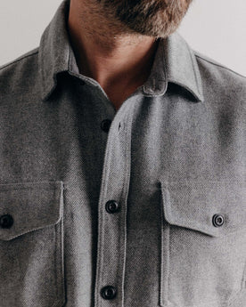 fit model showing off the buttons on The CPO Shirt in Heather Ash Twill, Wovens by Taylor Stitch