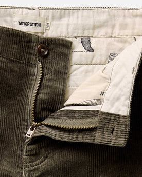 material shot of the zipper on The Carnegie Pant in Fatigue Olive Corduroy, Bottoms by Taylor Stitch