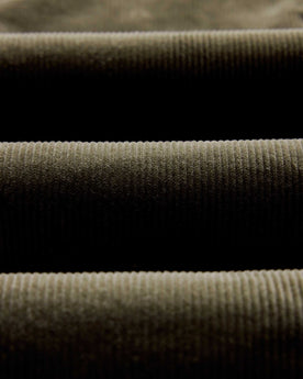 material shot of the fabric on The Carnegie Pant in Fatigue Olive Corduroy, Bottoms by Taylor Stitch