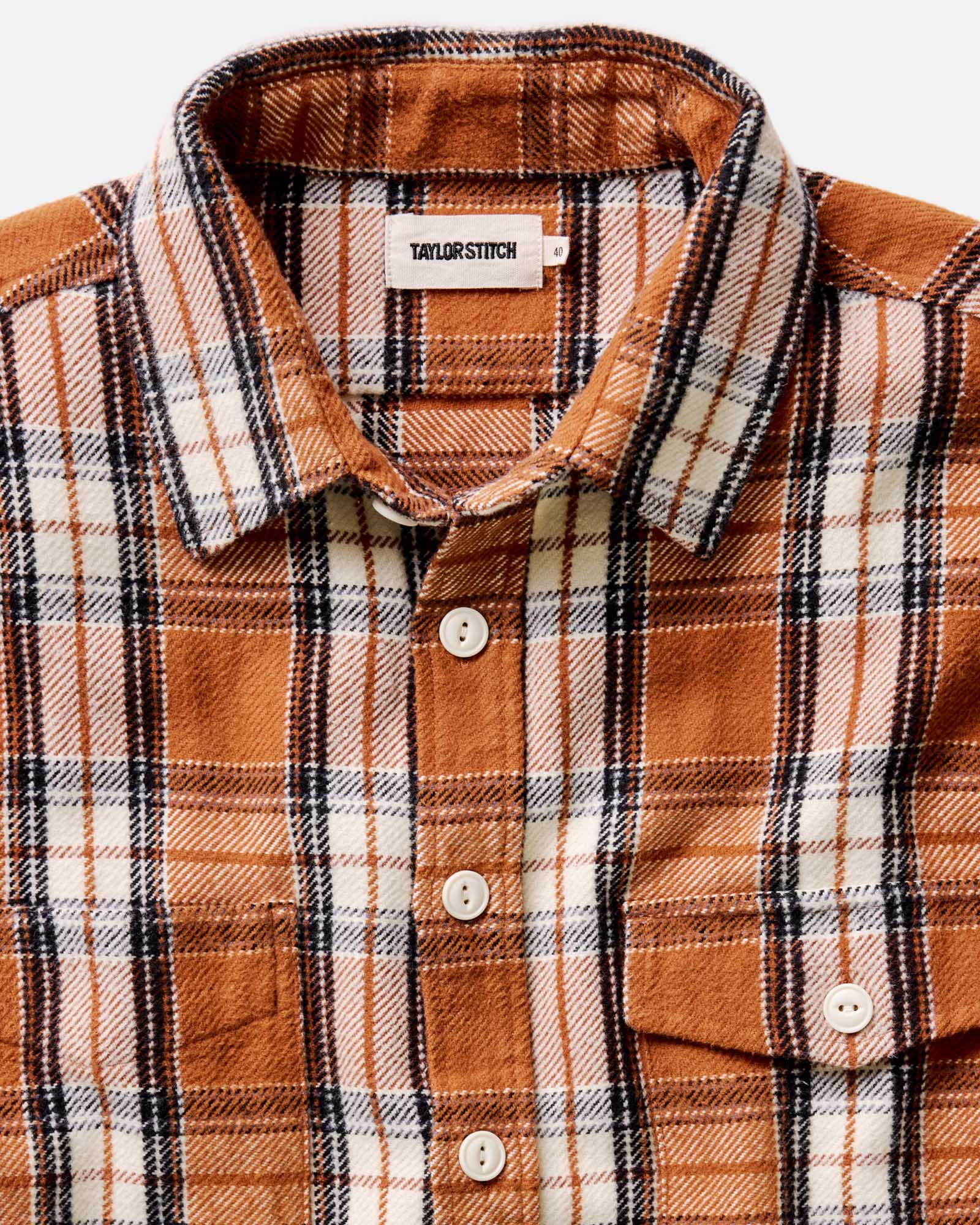 material shot of the collar on The Crater Shirt in Brick Plaid, Wovens by Taylor Stitch