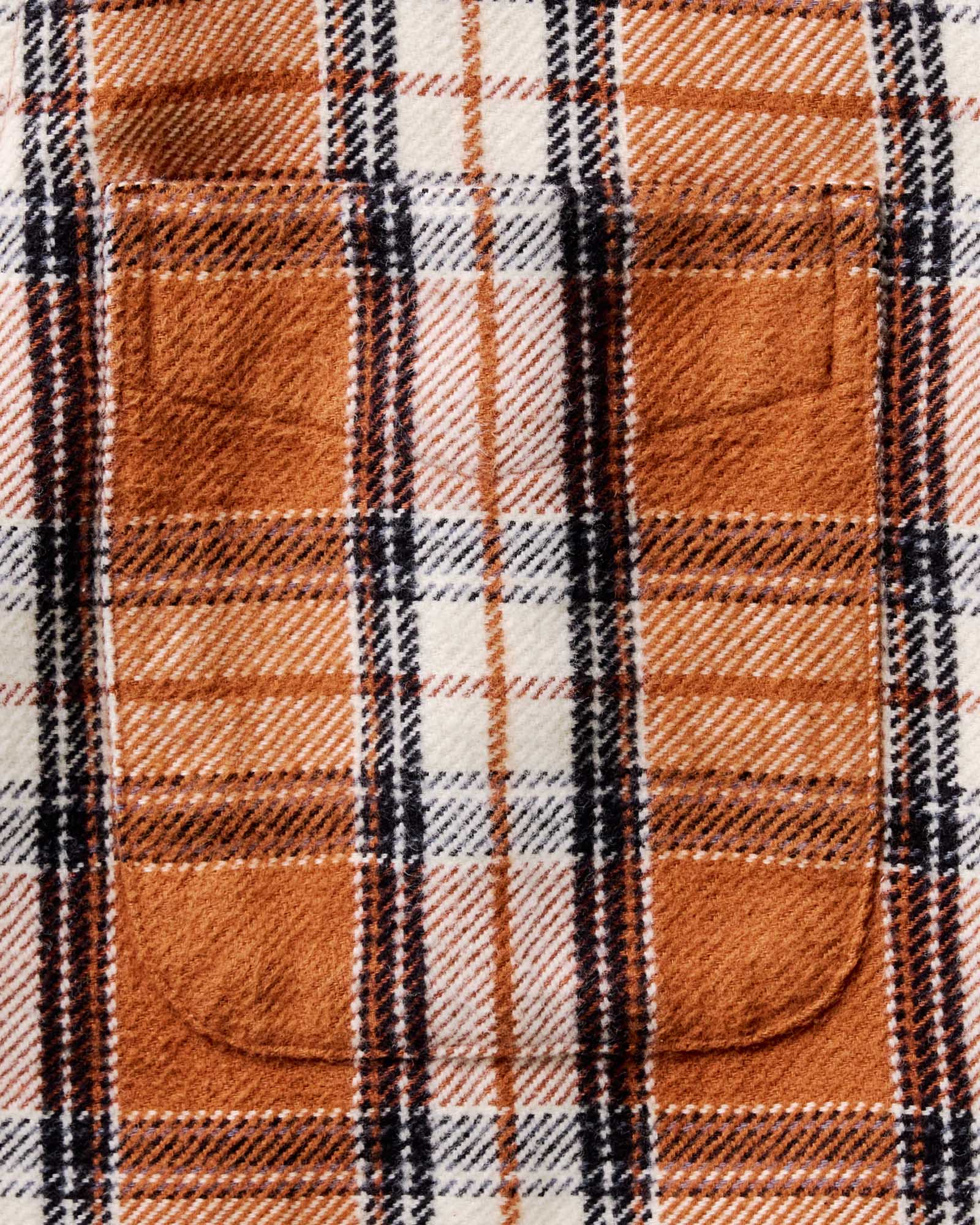 material shot of the pocket on The Crater Shirt in Brick Plaid, Wovens by Taylor Stitch