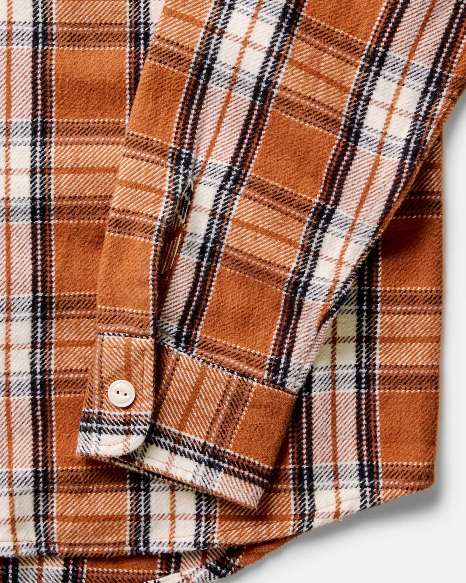material shot of the sleeves on The Crater Shirt in Brick Plaid, Wovens by Taylor Stitch