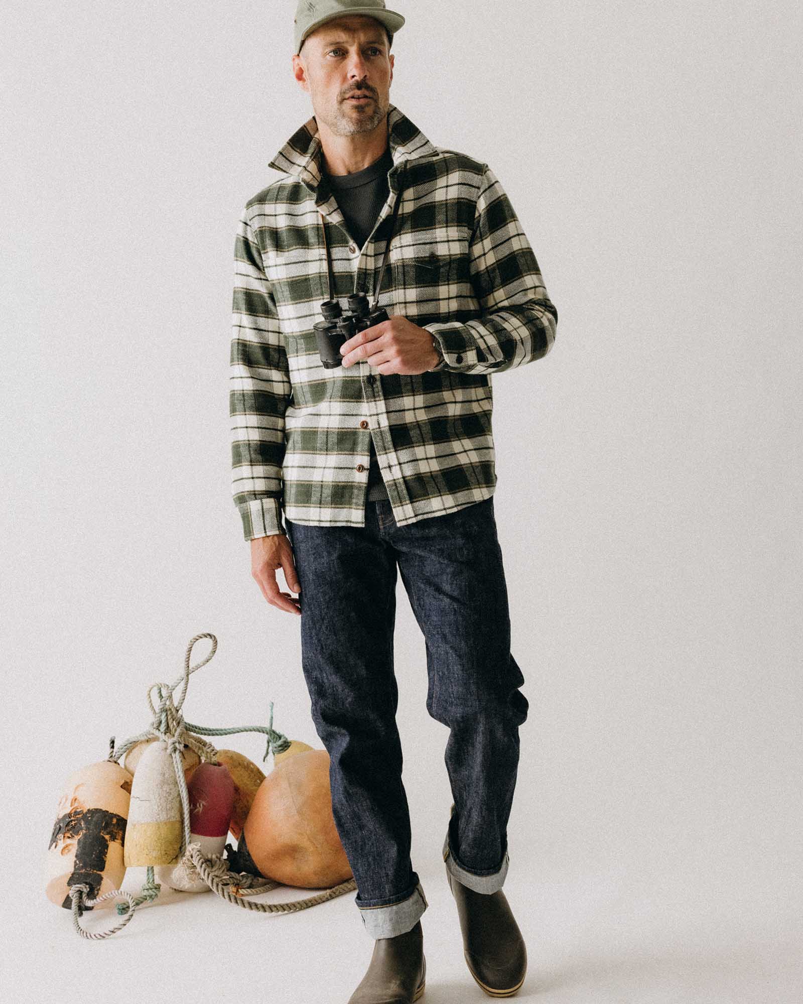 fit model posing in The Crater Shirt in Forest Plaid, Wovens by Taylor Stitch