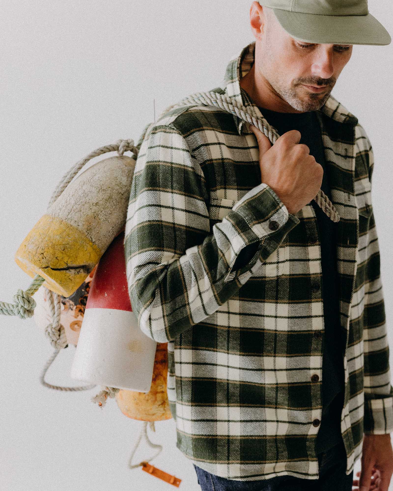 fit model walking wearing The Crater Shirt in Forest Plaid, Wovens by Taylor Stitch