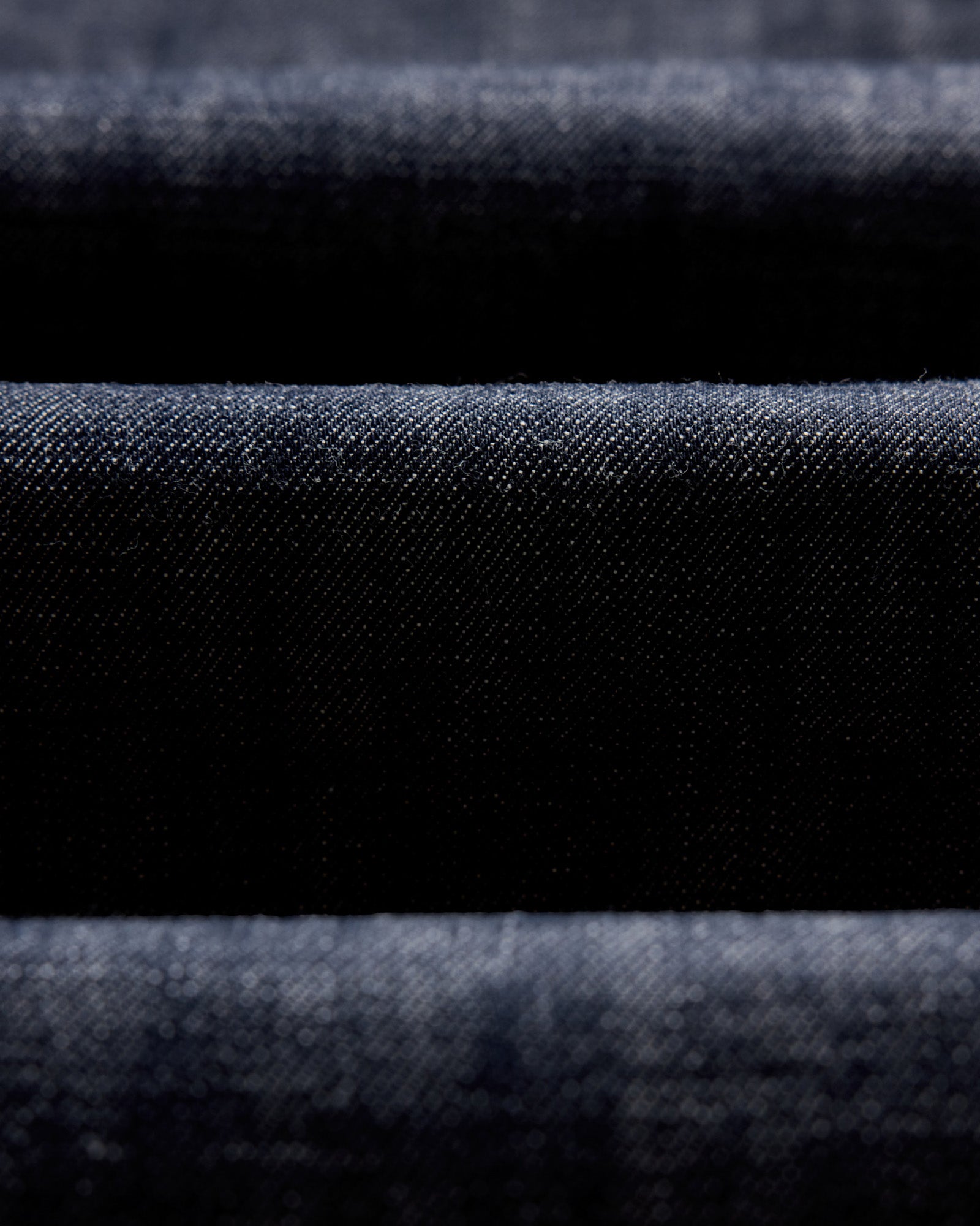 material shot of the fabric on The Democratic Jean in Rigid Organic Selvedge, Bottoms by Taylor Stitch
