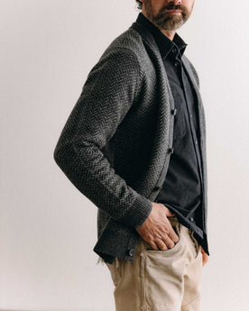 fit model posing in The Eddy Cardigan in Heather Charcoal Herringbone, Knits by Taylor Stitch
