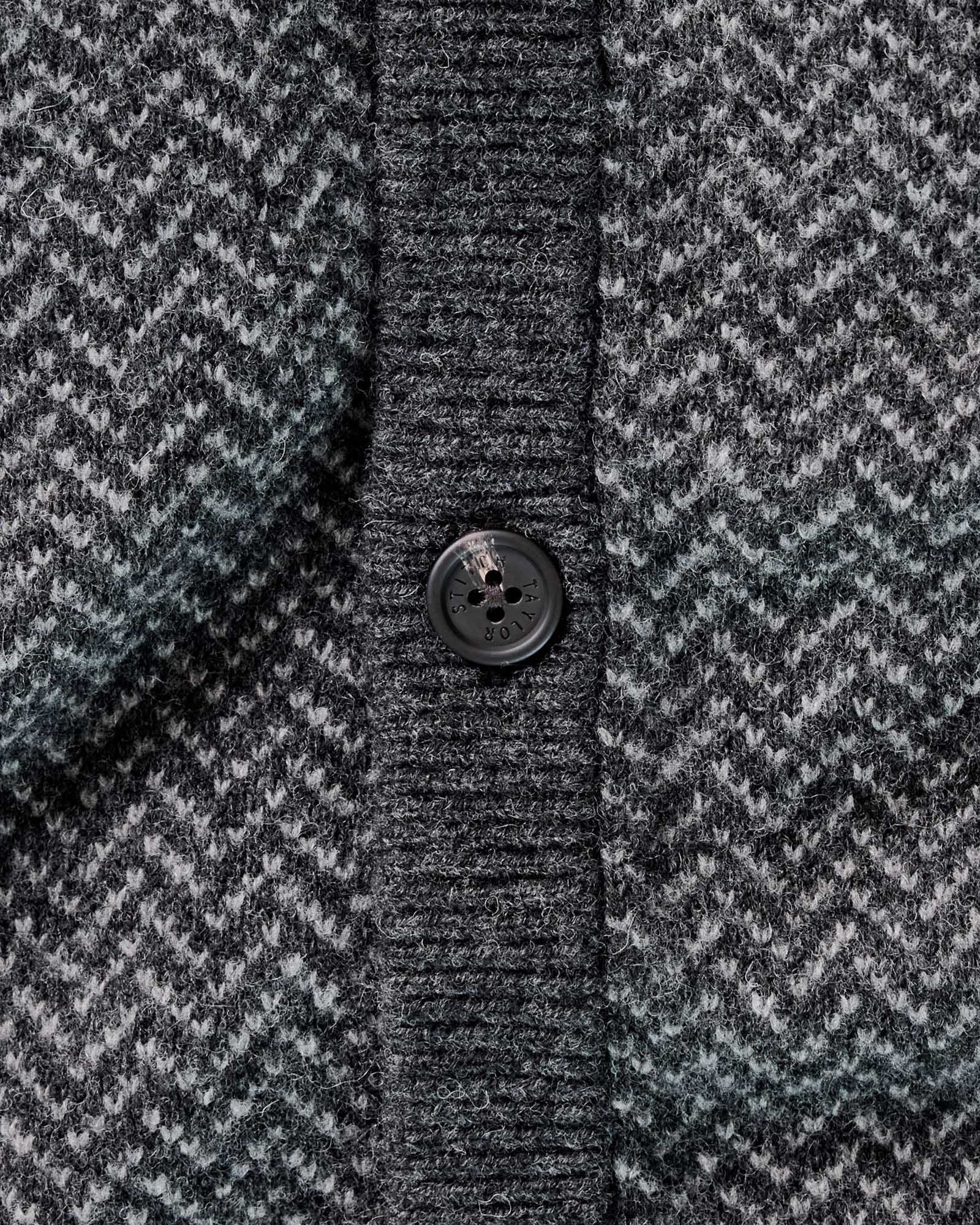 material shot of the buttons on The Eddy Cardigan in Heather Charcoal Herringbone, Knits by Taylor Stitch