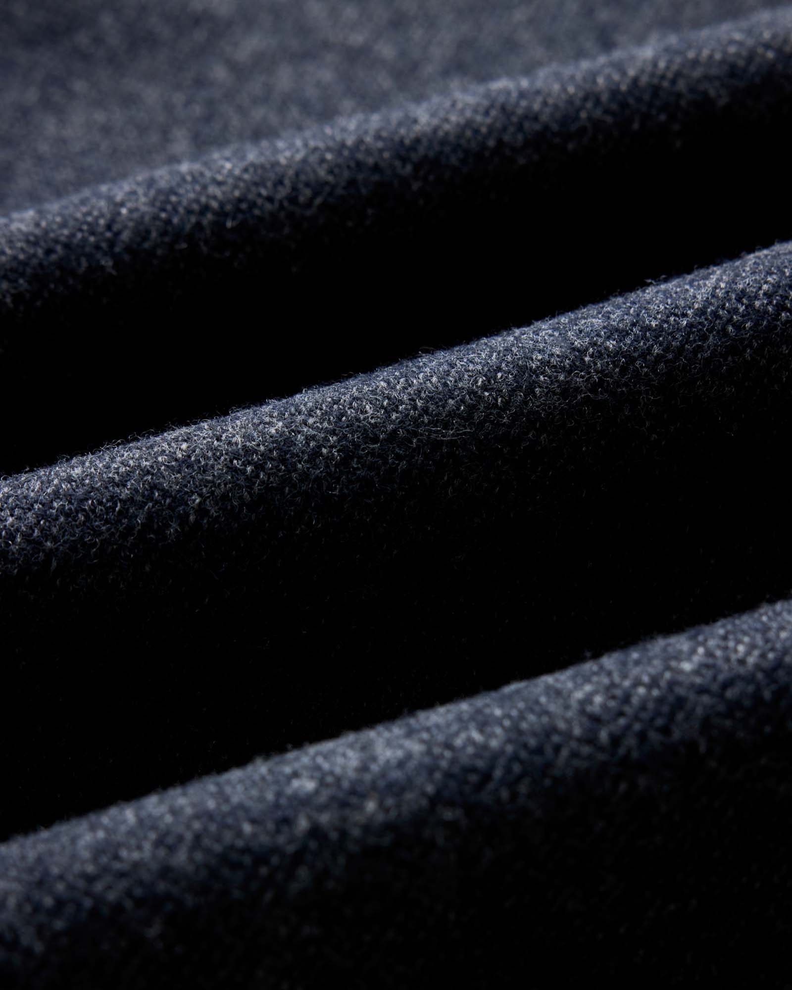 material shot of the fabric on The Evans Crew in Navy Birdseye Wool, Knits by Taylor Stitch