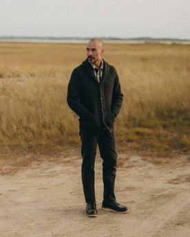 fit model showing off The Fisherman Shawl Cardigan in Heather Coal Merino, Knits by Taylor Stitch